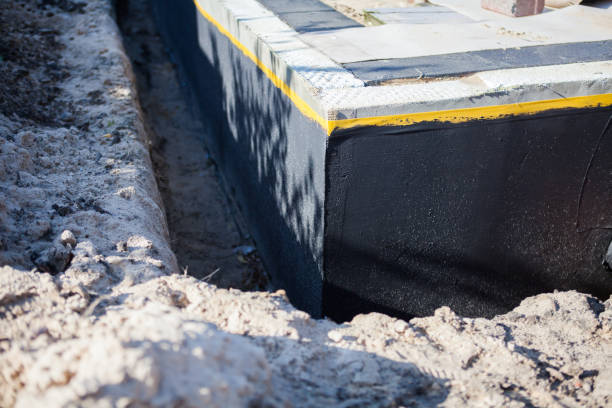 Professional Emergency Waterproofing technician working in Tippecanoe, IN